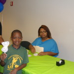 Student_Doing_Community_Service__at_East_Point_Library_2012_-_1