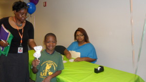 Student_Doing_Community_Service__at_East_Point_Library_2012_-_1