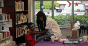 Student_Doing_Community_Service_at_East_Point_Library_2012_-_5